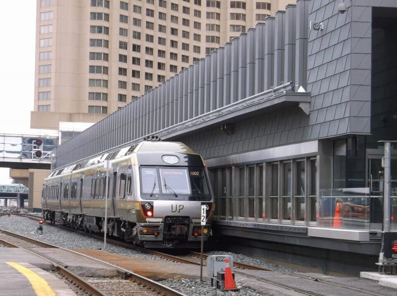 A Union-Pearson express train parked in a train station.